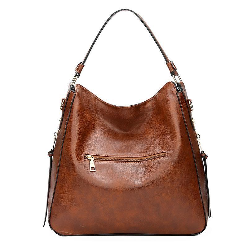 Bolso hobo de cuero de lujo antirrobo + monedero de tipo pouch gratis