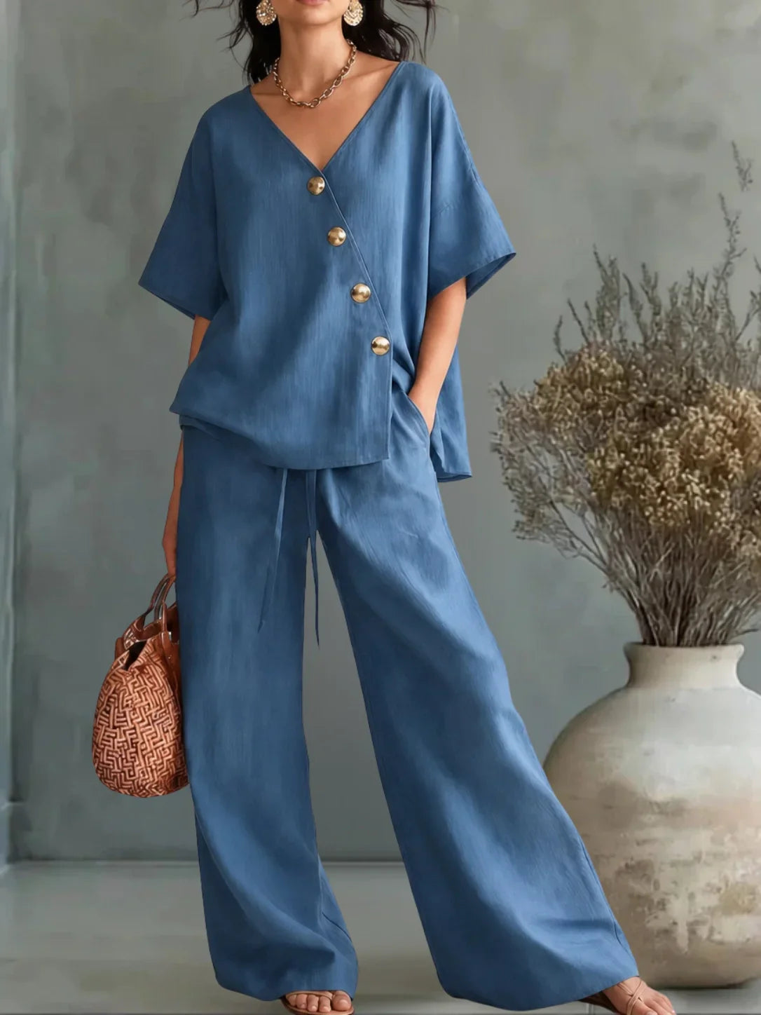 Greta | Overall Design with a V-Shaped Slit and Buttons