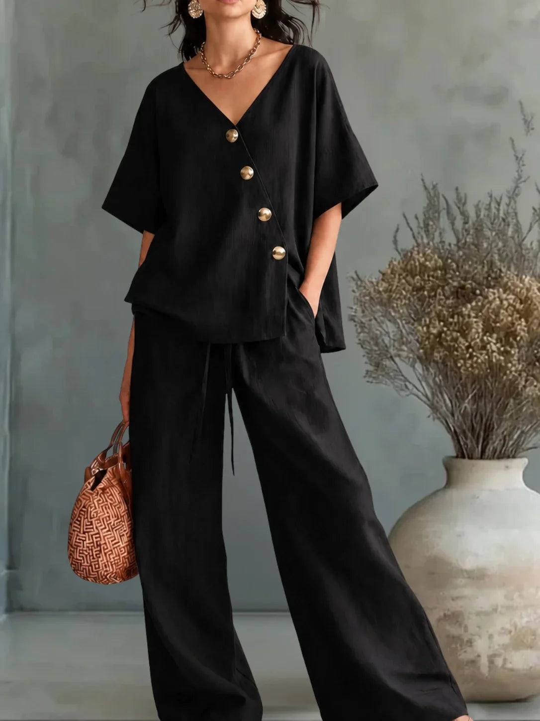Greta | Overall Design with a V-Shaped Slit and Buttons