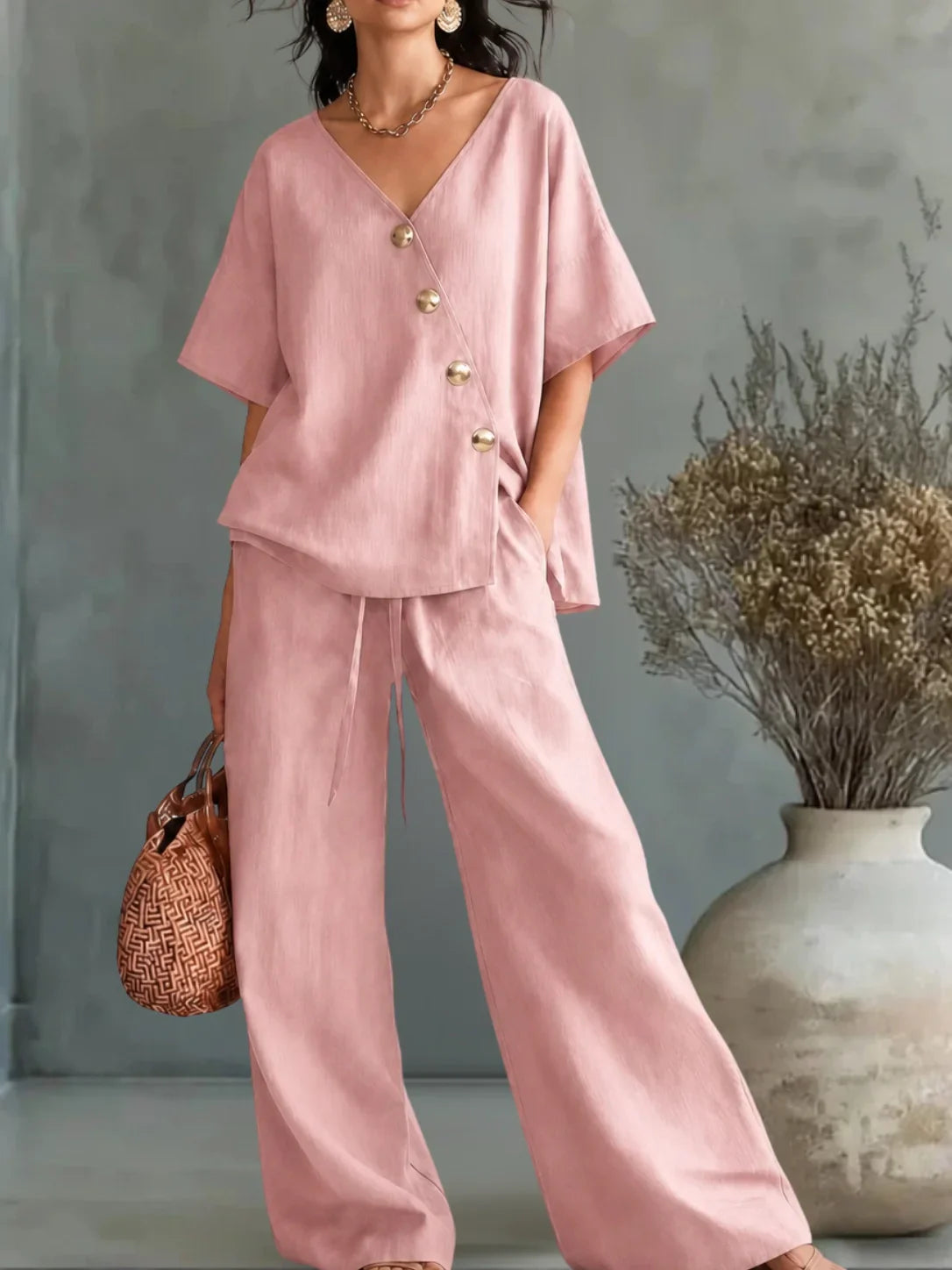 Greta | Overall Design with a V-Shaped Slit and Buttons