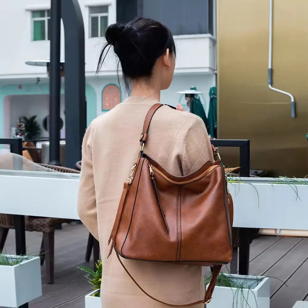Bolso hobo de cuero de lujo antirrobo + monedero de tipo pouch gratis