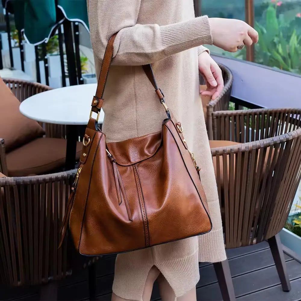 Bolso hobo de cuero de lujo antirrobo + monedero de tipo pouch gratis